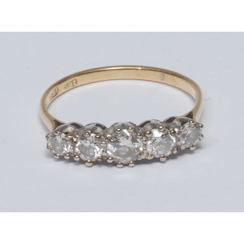 787 - A diamond quintet line ring, linear set with five graduated old brilliant cut diamonds, total estima... 