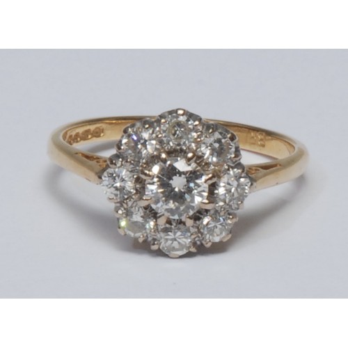 784 - A diamond flower head cluster ring, central round brilliant cut diamond approx 0.30ct, eight claw se... 