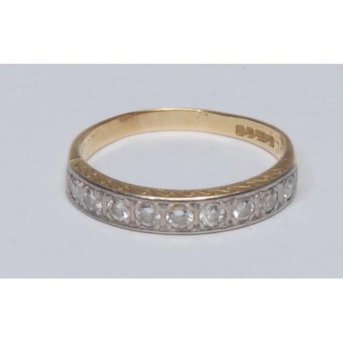 785 - A diamond half eternity ring, linear set with nine round brilliant cut diamonds, total estimated dia... 