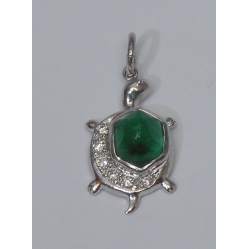 802 - A novelty emerald and diamond pendant, as a turtle, irregular emerald cabochon crested with a row of... 