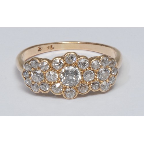 790 - A diamond triple head cluster ring, shaped crest of three interconnected flowers pave inset with twe... 