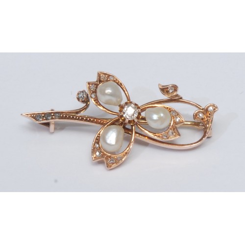 778 - A diamond and pearl brooch, three petal body inset with three irregular creamy white pearls and twen... 