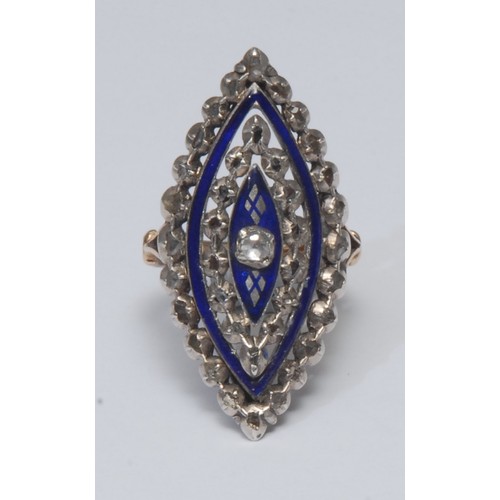 820 - A Victorian style diamond and blue enamel dress ring, multi-layered navette crest inset with thirty ... 