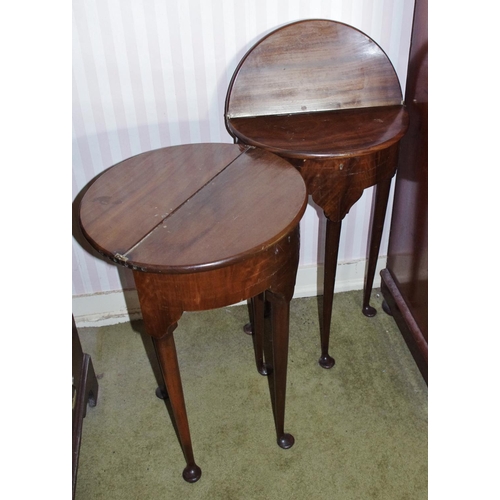 108 - A pair of George II Revival mahogany demi-lune tea tables, of small proportions, each with folding t... 