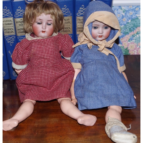 222 - A German bisque head doll, sleeping blue eyes, open mouth, composite jointed body, impressed Germany... 