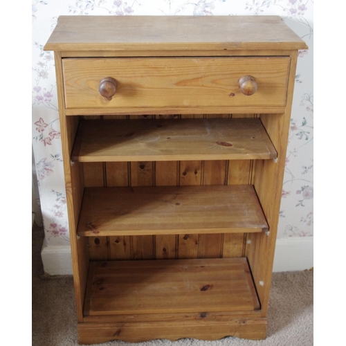 226 - A pine bookcase, with drawer and open shelves, 101cm high, 66cm wide

**Please note all lots must be... 