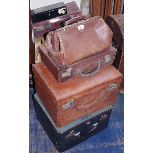 232 - A Gladstone bag;  suitcases, various

**Please note all lots must be collected from Sudbury, Derbysh... 