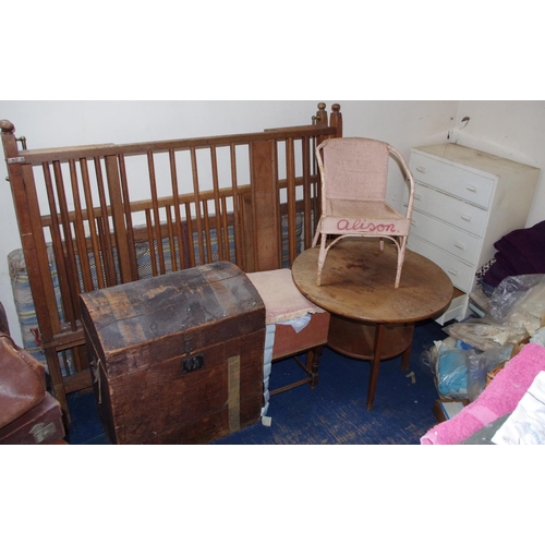 233 - An early 20th century domed top pine trunk;  a mid 20th century child's cot;  an occasional table;  ... 