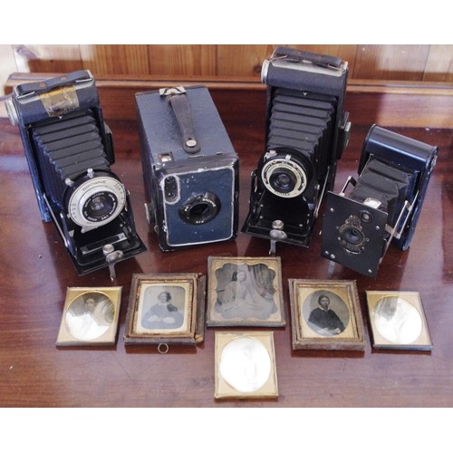 251 - A Kodak Brownie camera; another;   Kodak Best Pocket Autographic bellows camera;  ambrotypes;  etc

... 