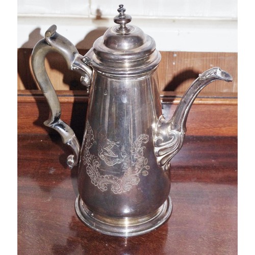 264 - A George II silver tapered cylindrical coffee pot, double stepped domed cover and spire final, eboni... 