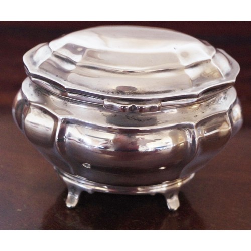 269 - A silver lobed oval sugar box, hinged cover, cabriole legs, 12cm wide, Goldsmith and Silversmith Com... 