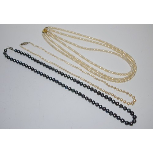 313 - A graduated pearl single string necklace, with diamond set navette  shaped 9ct gold clasp;  a freshw... 