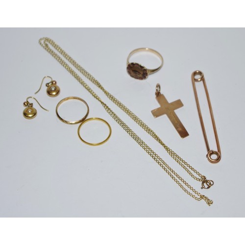 338 - A pair of 15ct gold earrings, 1.6g; an 18ct gold ring, 1.3g;  a 9ct gold crucifix, 2.3g; an gold col... 