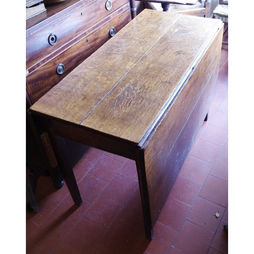 79 - A George II oak drop leaf dining table, 102cm wide, 147cm long, 188cm wide,  c.1740

**Please note a... 