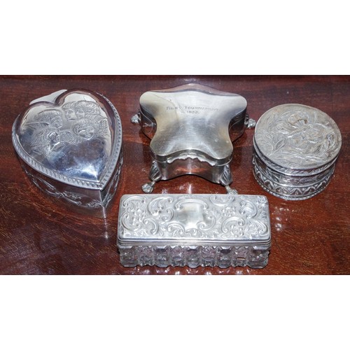 85 - A silver heart shaped box, embossed with Reynolds angels;  other trinket boxes