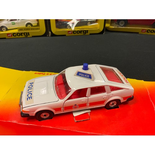 82 - A Corgi 1118 Chubb Pathfinder, red, yellow interior, gold nozzle; a Corgi 339 Rover 3.5 Police car; ... 