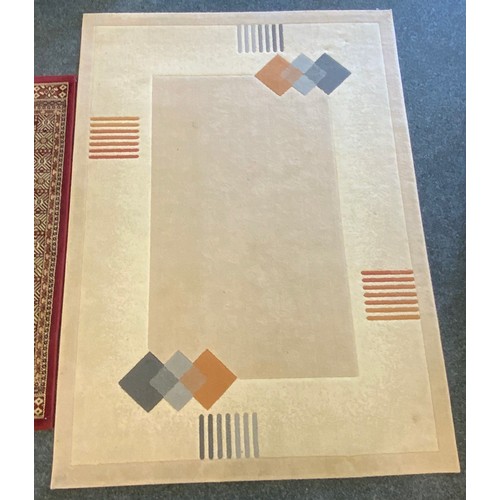 126 - A modern contemporary design rug, paneled and linear design upon a two tone cream ground, 234cn x 17... 