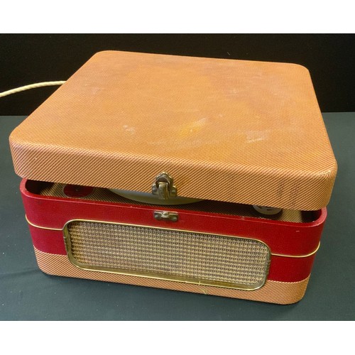 130 - A vintage 1950s/60s Bush type RP portable record player, Garrard arm, 16,33,45,78 speeds, red and be... 