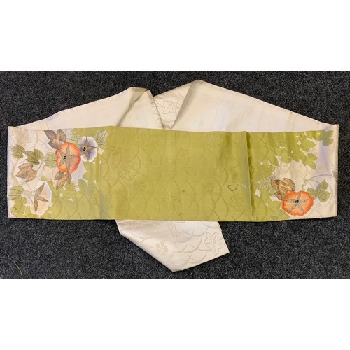 144 - Fashion & Textiles - A Japanese Kimono decorated with butterflies and flowers upon a russet and blue... 