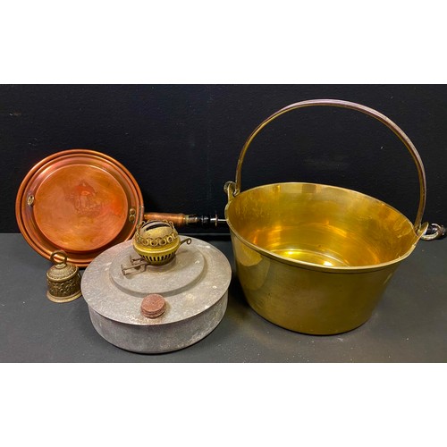 180 - A brass jam pan; an oil chick brooder; copper bed pan etc.