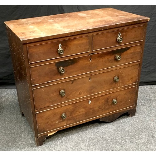 195 - A George III mahogany chest of drawer, two cockbeaded short drawers over three graduated, brass drum... 