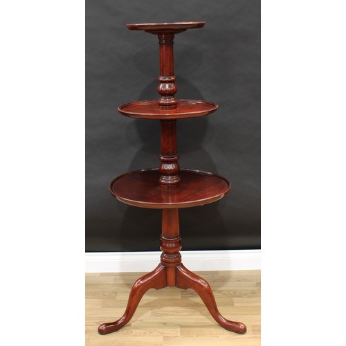 205 - A George III style mahogany three-tier dumbwaiter, circular dished graduated plateaux, turned pillar... 