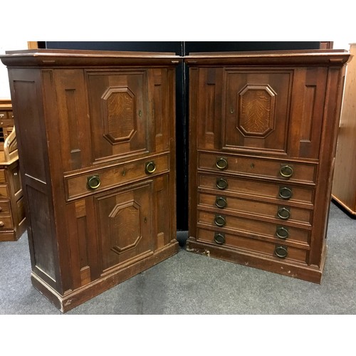 206 - A near pair of 19th century style oak cupboards, fielded panel door to top over long drawer, brass h... 