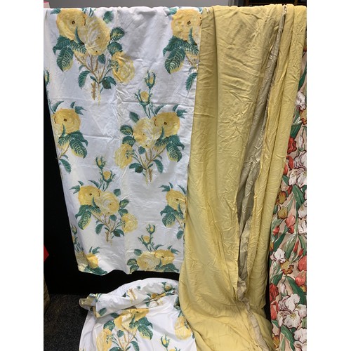 208 - A pair of Laura Ashley Home lined curtains printed with yellow roses, 106cm wide, 131cm drop;  other... 