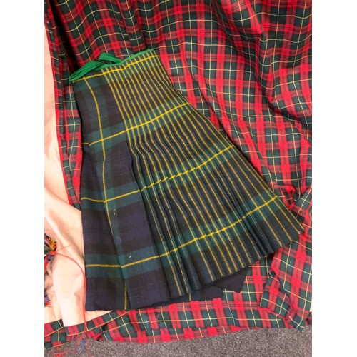 210 - Textiles - a Scottish Military issue Gordon Highlanders Tartan Kilt, marked W D T surrounding an iss... 