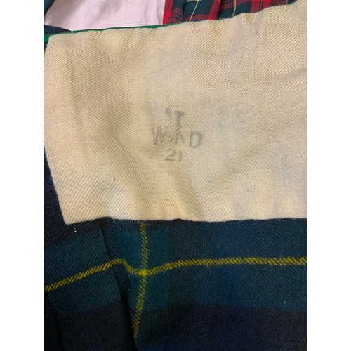 210 - Textiles - a Scottish Military issue Gordon Highlanders Tartan Kilt, marked W D T surrounding an iss... 