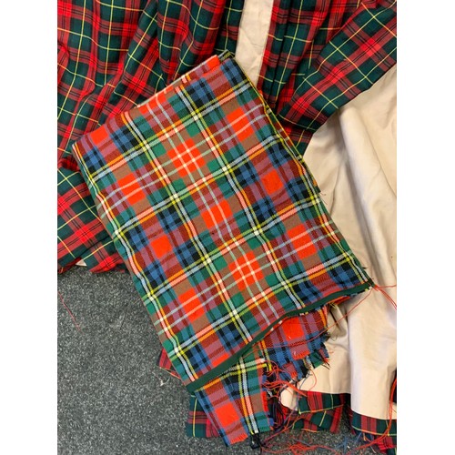 210 - Textiles - a Scottish Military issue Gordon Highlanders Tartan Kilt, marked W D T surrounding an iss... 