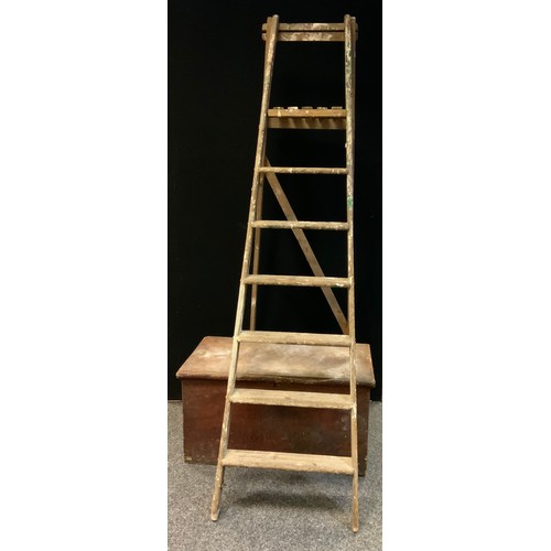 207A - A pair of wooden folding step ladders, 212cm long;  a rectangular pine trunk, hinge lid, 84cm wide, ... 