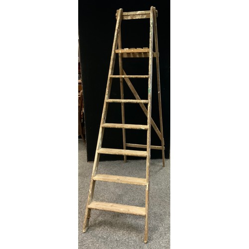 207A - A pair of wooden folding step ladders, 212cm long;  a rectangular pine trunk, hinge lid, 84cm wide, ... 