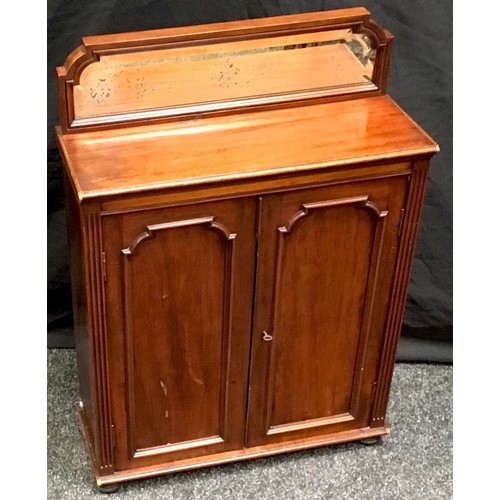 196 - A Victorian mahogany mirror back cabinet of small proportions, shaped bevel edge mirror back to top,... 