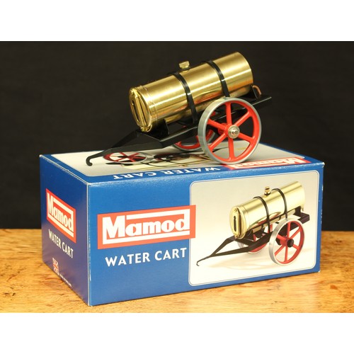 5063 - A Mamod water cart, polished brass cart on a black trailer, red spoked wheels, boxed with original i... 