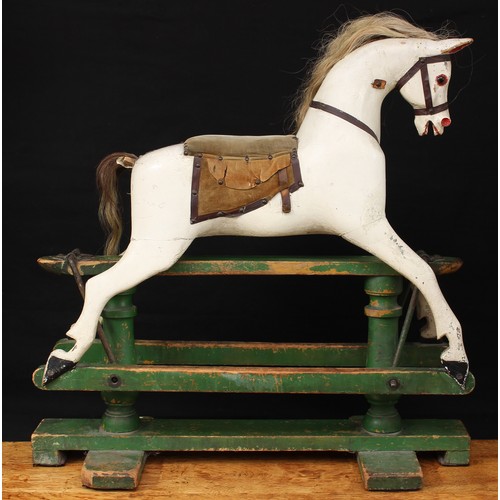 5180 - A late 19th/early 20th century children's rocking horse of small proportions, the carved, gesso and ... 