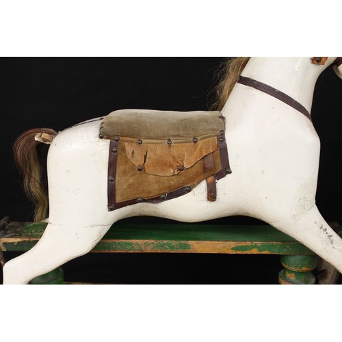 5180 - A late 19th/early 20th century children's rocking horse of small proportions, the carved, gesso and ... 