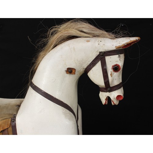 5180 - A late 19th/early 20th century children's rocking horse of small proportions, the carved, gesso and ... 