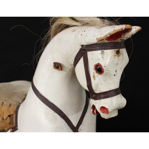 5180 - A late 19th/early 20th century children's rocking horse of small proportions, the carved, gesso and ... 