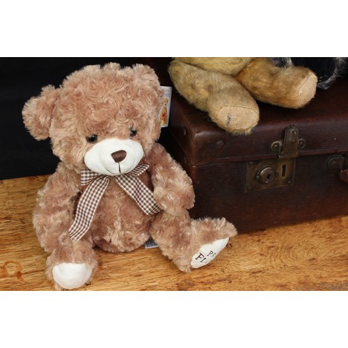 5190 - A mid-20th century straw-filled golden mohair jointed teddy bear, amber and black plastic eyes, pron... 