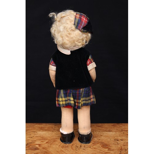 5195 - A 1940's Chad Valley cloth head and cloth jointed bodied doll, moulded face with painted features in... 
