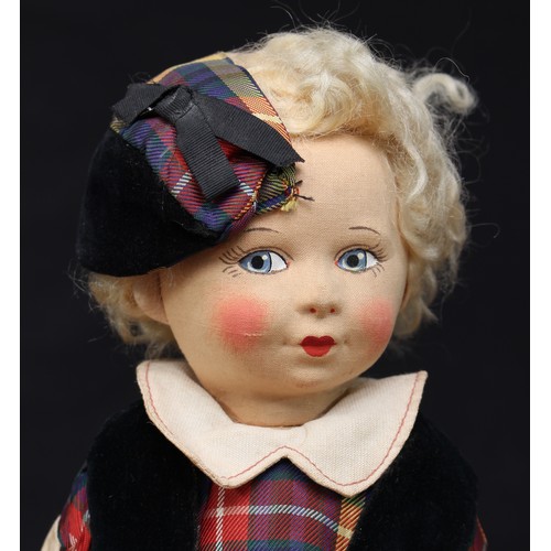 5195 - A 1940's Chad Valley cloth head and cloth jointed bodied doll, moulded face with painted features in... 