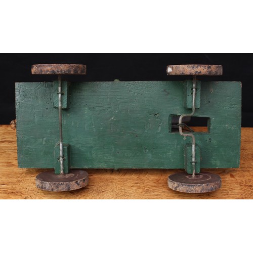 5203 - Folk Art - an early 20th century painted wooden novelty pull along toy, in the form of a Horse and j... 