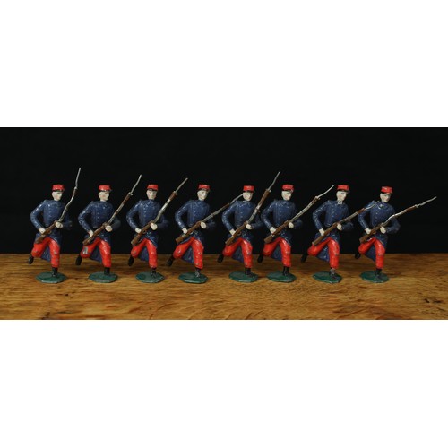 5214 - A set of eight oversized lead figures as French Line infantrymen, each at the trail, hexagonal shape... 