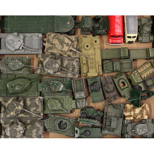 5351 - A large collection of playworn and unboxed Military die-cast models, spare parts, accessories and fi... 