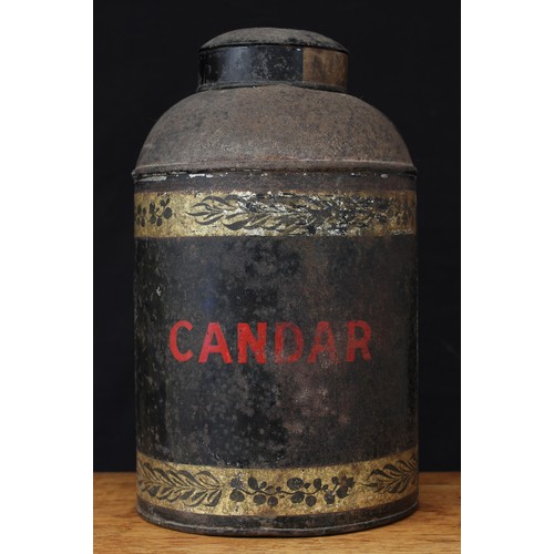 5408 - Advertising - a late 19th century black toleware canister and cover, of cylindrical form, painted bo... 