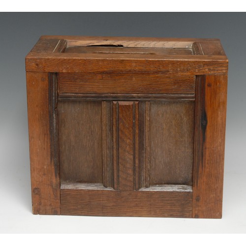 3069 - A 19th century oak ballot box, constructed from salvaged sections of period panelling, 26cm  high, 3... 