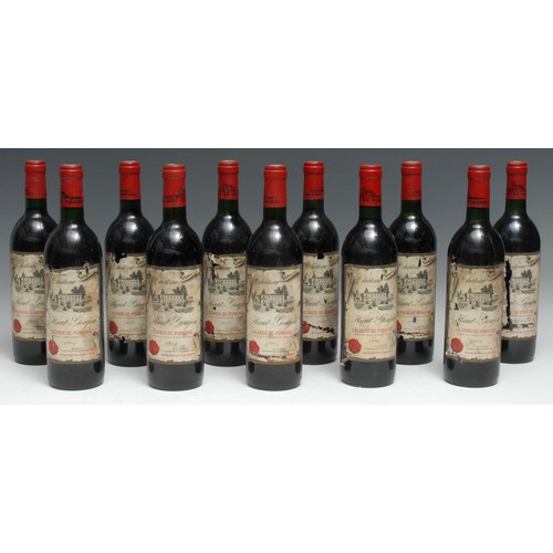 3976 - Eleven bottles of Château Haut-Goujon 1985 Lalande-de-Pomerol, 75cl, mixed label conditions, levels ... 