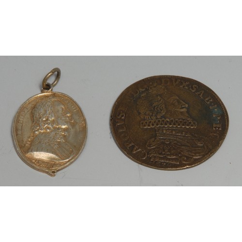 3636 - King Charles the Martyr - a silver-gilt coloured metal commemorative pendant medallion, in relief wi... 