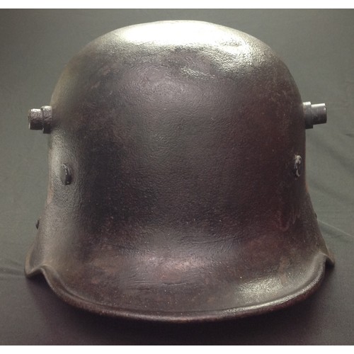 74 - WW1 Imperial German Army M1916 Stahlhelm Steel Helmet. This helmet has been repainted black and has ... 